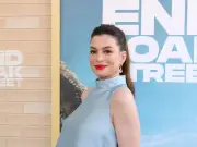 Anne Hathaway declines photographer request as she proudly reveals her baby bump