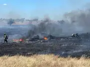 Apache crash kills two, sparks Texas wildfire, homes evacuated