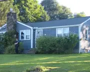 Arrest warrant issued for wife of Massachusetts officer found dead