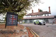 Asylum seekers in UK hotels halved to 16,021