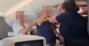 BA flight attendant breaks up scuffle in viral video