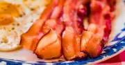 Bacon tastes better if you add water to the pan before cooking