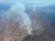 Barcelona fire: Huge blaze sends smoke visible from Ryanair flight