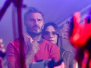 Beckhams watch Cruz's Reading debut as fans chant David's name