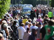 Bonnie Tyler's coffin returns to Mumbles as thousands pay tribute