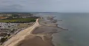 Boy, 7, died from drowning and brain injury, inquest hears