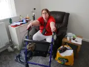 Brain injury survivor says flood left her 'turned upside down'