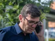 Burnham says no embarrassment over Trump aide impostor messages