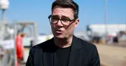 Burnham's Holiday Sparks Reform Criticism as PM Takes Break