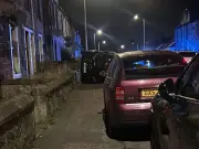 Car flipped on side after early hours crash near Scottish football stadium