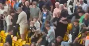 Carabao Cup clash marred by violent stand brawl at Molineux