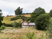Charming Welsh Barn Conversion with Lake and Orchard for Sale