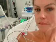 Chemmy Alcott rushed to hospital with collapsed lung after lake jump