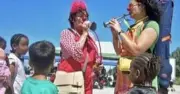 Clowns entertain Calais migrants near smuggling gangs