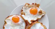 Cook 'perfect' fried eggs with crispy edges by ditching frying pan for 1 easier method