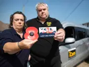 Council orders taxi firm to remove poppies after complaint