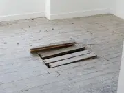 Couple find original parquet flooring under carpet in 1950s London home