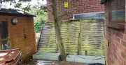 Couple's 14-year fence row ends in £150k legal bill