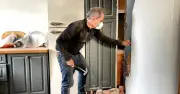 Couple's shock after knocking down kitchen wall reveals hidden cellar