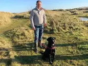 Dad fights off pocket bully attacking Labrador in Flint