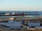 Dinghy carrying 157 migrants capsizes in Channel after fire