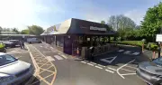 Dog dies in McDonald's car park fire as man arrested
