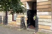 Double murder hunt launched after two men found dead in Glasgow flat