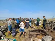 Dozens join dig at Bronze Age cairns before rebuild