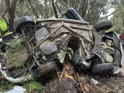 Driver escapes serious injury after car wraps around tree
