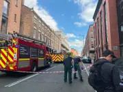 Duke Street closed as man on roof sparks emergency response