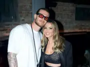 Ex-Premier League ace's wife wows in bold bikini as fans spot tattoo