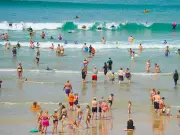 Father drowned trying to save daughter at Fistral Beach, inquest hears