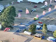 Festival hero saves trapped revellers after sign crashes down