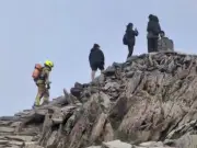 Firefighter in full kit who skipped Yr Wyddfa summit queue hits back at critics