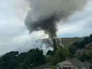 Firefighters tackle large blaze at Saddleworth industrial site