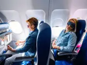 Flight Attendant Reveals Hidden Button for Extra Seat Space