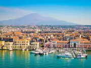 Foreign Office warns travellers to Italy and Sicily of wildfires and Etna ash