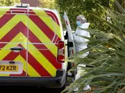 Forensics at Salford murder scene as investigation continues