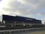 Gatwick holiday parking fire destroys cars; man bailed