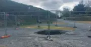 Grandfather 'swallowed' by 30ft sinkhole at Cornwall holiday park