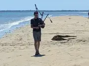 Hamilton pupil pipes on Normandy beaches for US 250th