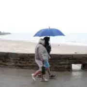 Heavy rain and thunderstorms sweep UK with flash flood warnings