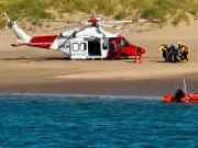 Helicopter and lifeboats rescue woman from Caldey Island beach