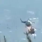 Helicopter bursts into flames after midair crash in Greece