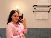Holly Ramsay Shows Off Baby Bump in Pink Pyjamas