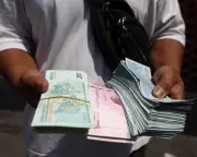 Iran's rial hits record low as US sanctions loom