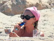 Kate Moss Smokes and Vapes with Wellness Pal in Ibiza Beach Day