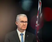 Labor to Cut Migration Despite Burke Speech Delay