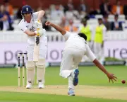 Lawrence Extends Lead as Rain Halts England's Victory Push