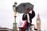Londoners welcome heavy rain after driest summer on record